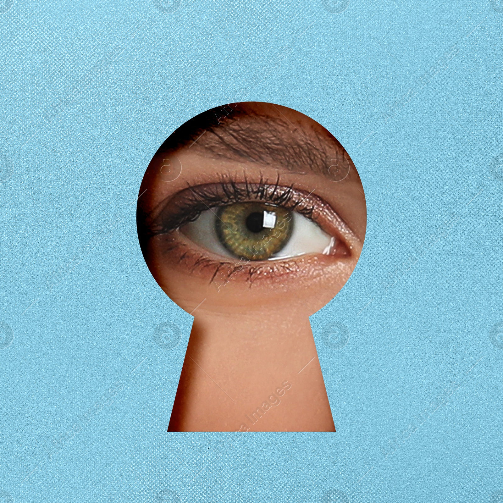 Image of Woman looking through keyhole in light blue surface