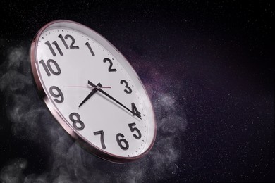 Image of Clock against night starry sky, space for text, Time concept