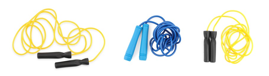 Image of Different skipping ropes on white background, set. Sport equipment