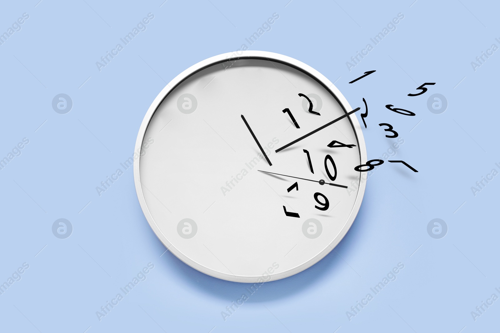 Image of Numerals and hands flying away from clock on light blue background. Time is running out