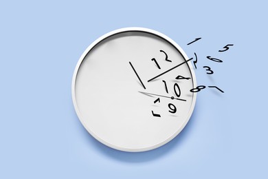 Image of Numerals and hands flying away from clock on light blue background. Time is running out