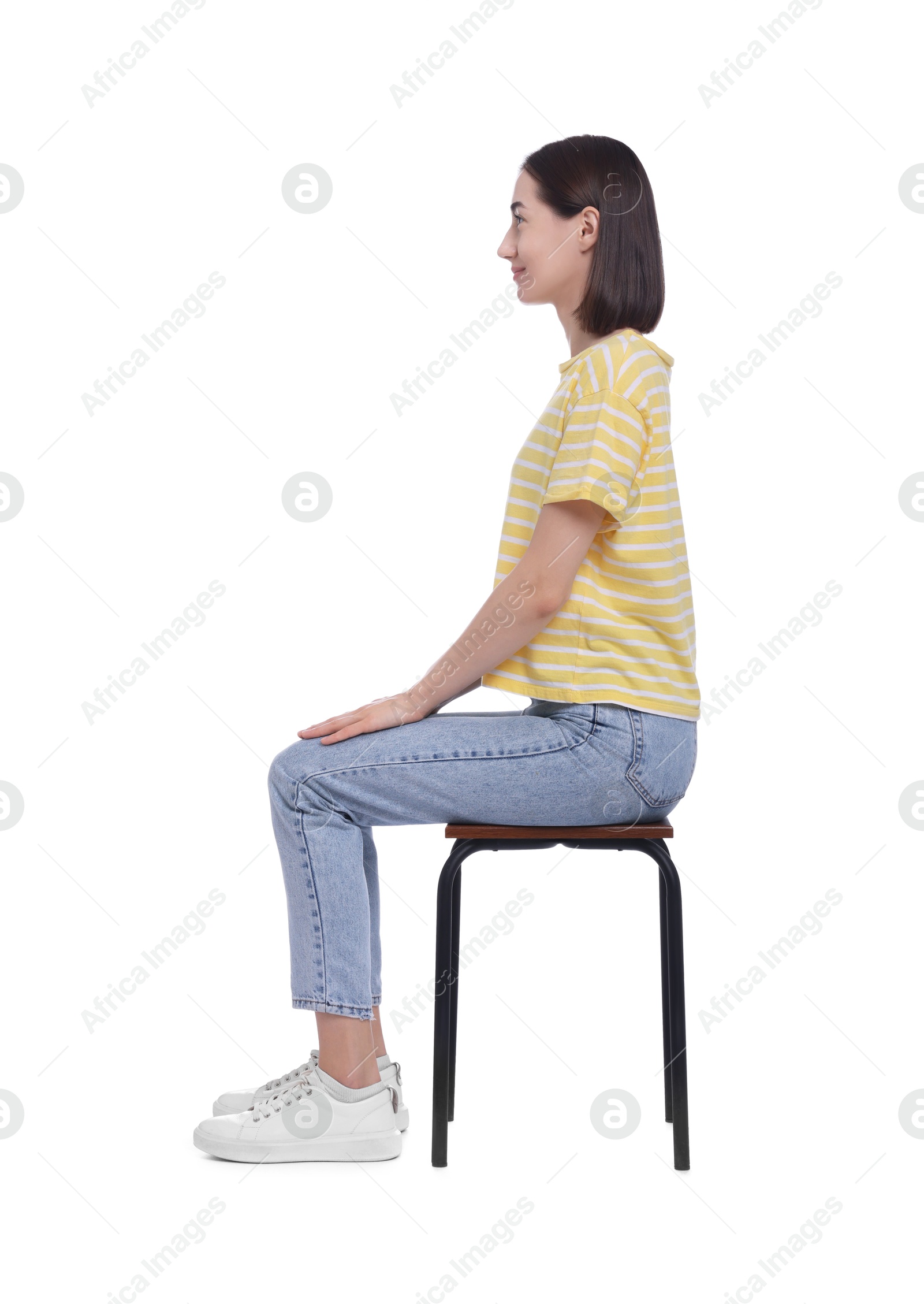 Photo of Woman with good posture sitting on chair against white background