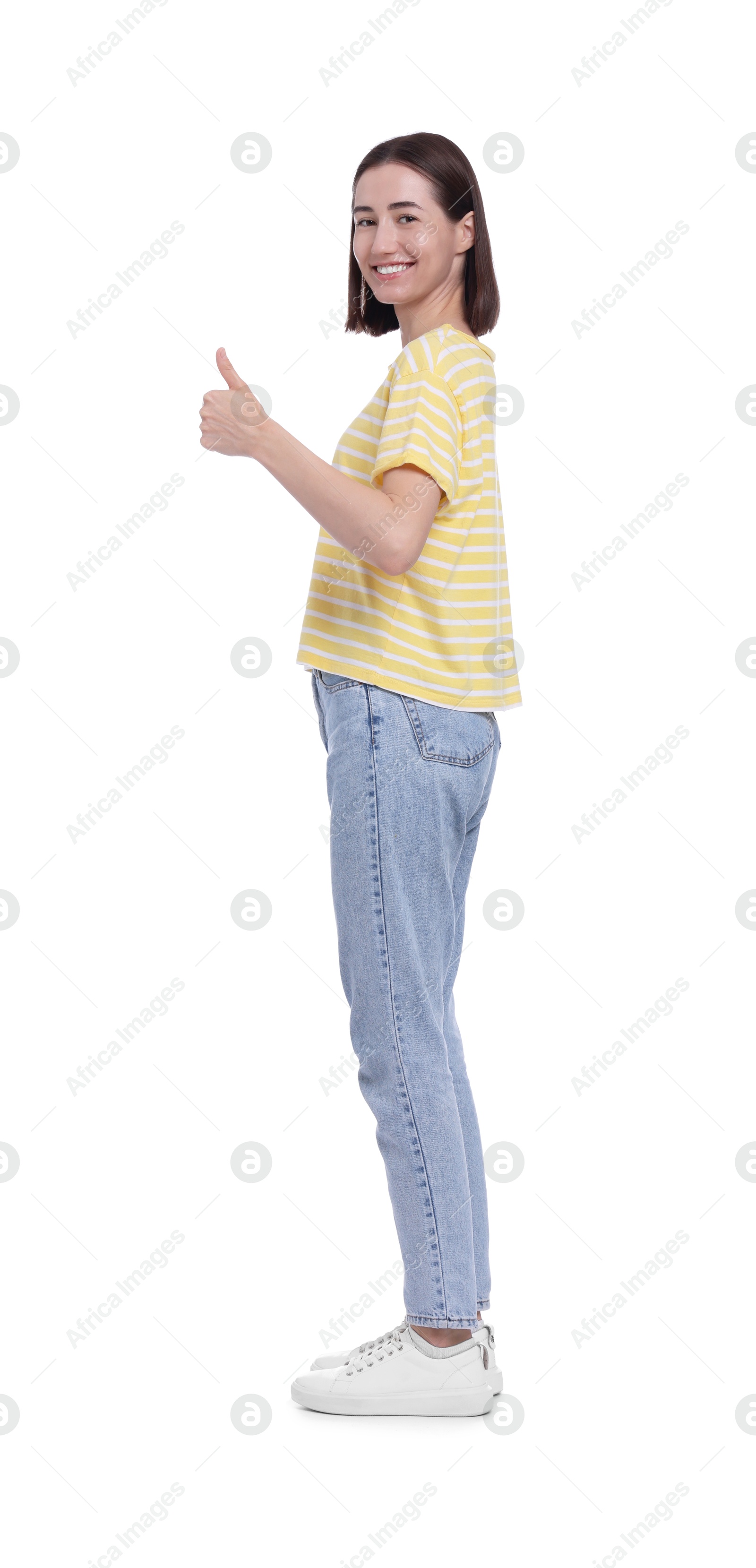 Photo of Woman with good posture showing thumbs up on white background