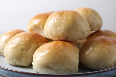 Photo of Delicious dough balls on plate, closeup view