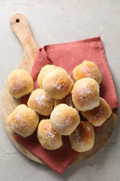 Delicious dough balls on light table, top view