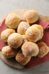 Delicious dough balls on light table, top view