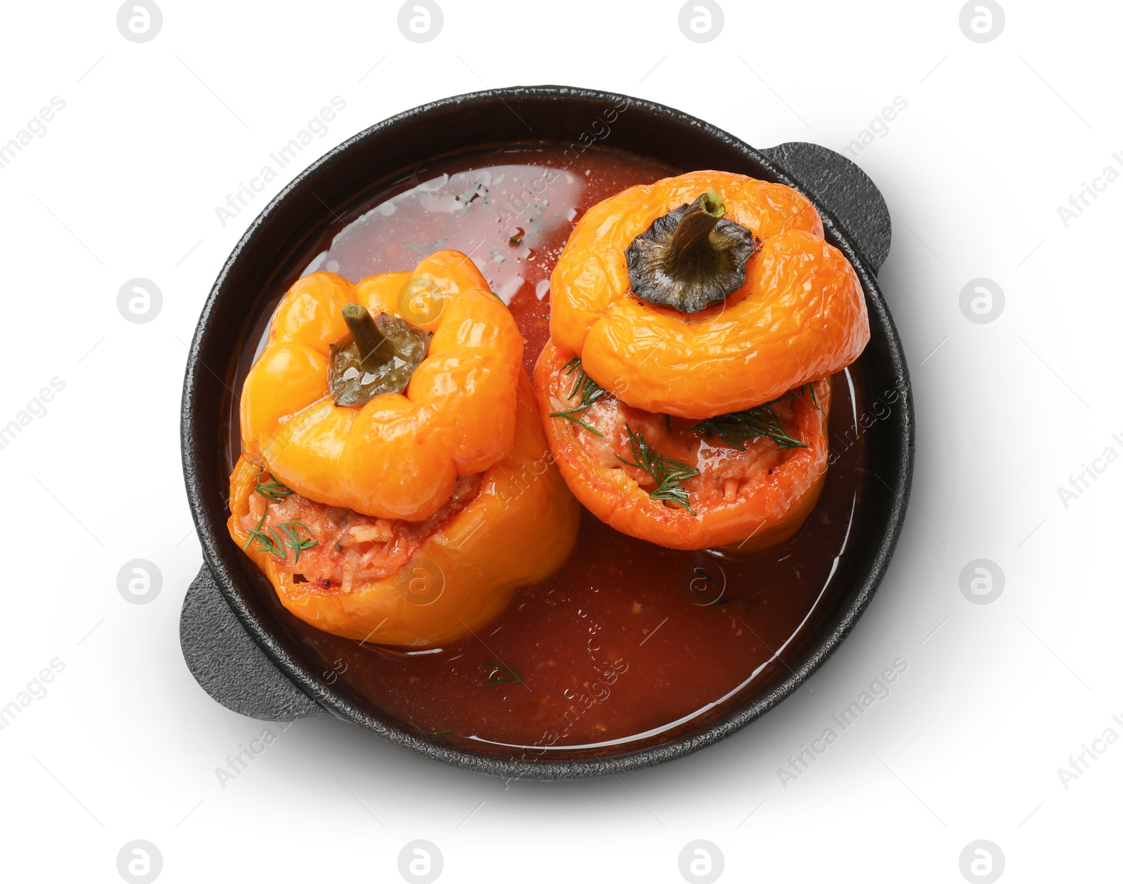 Photo of Tasty stuffed peppers in pan isolated on white, top view