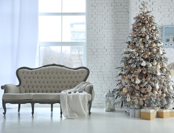 Photo of Beautiful interior of living room with decorated Christmas tree