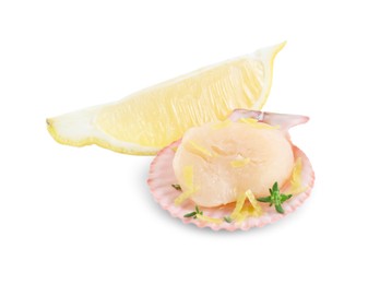 Photo of Raw scallop with lemon zest, thyme and shell isolated on white