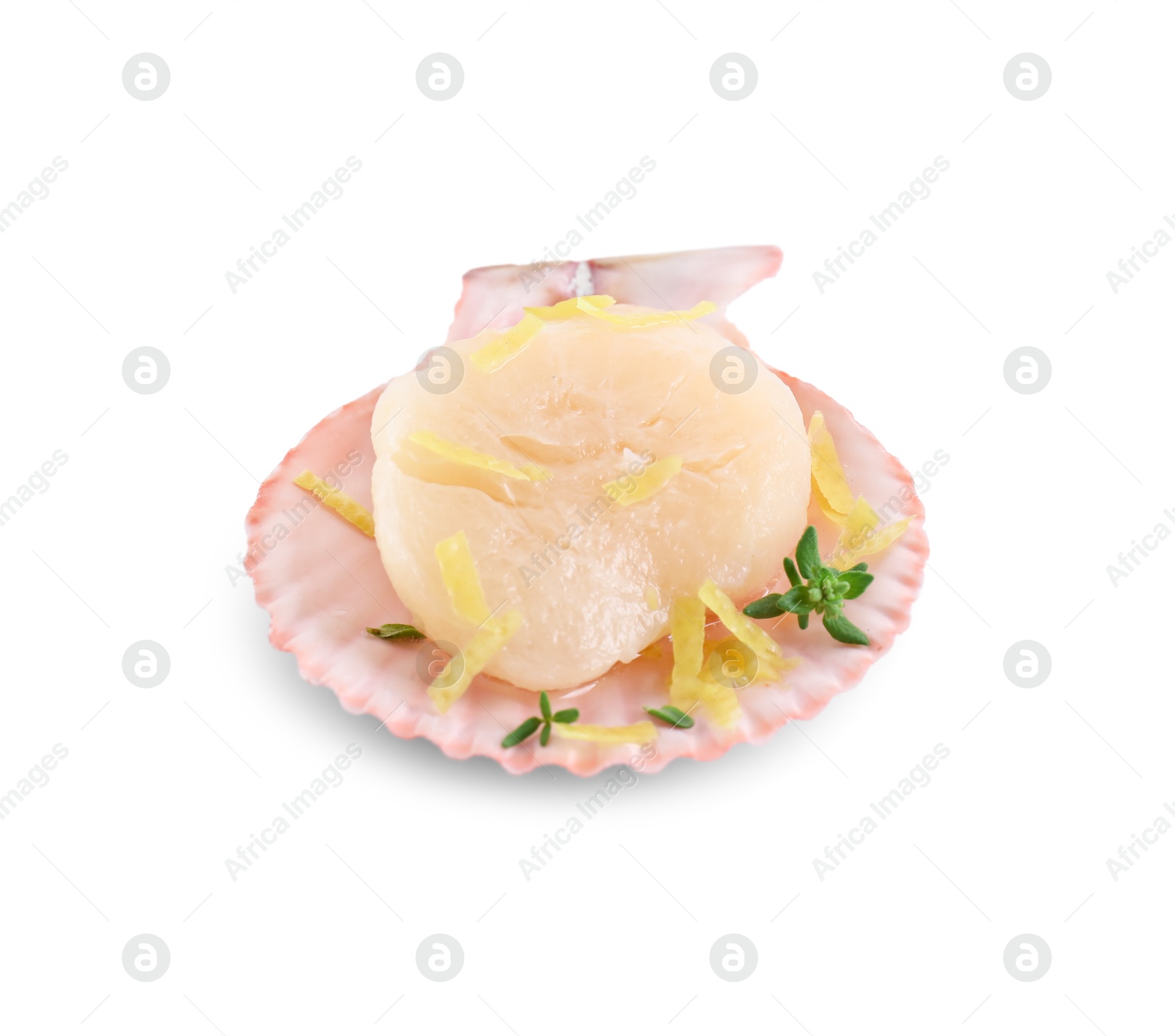 Photo of Raw scallop with lemon zest, thyme and shell isolated on white