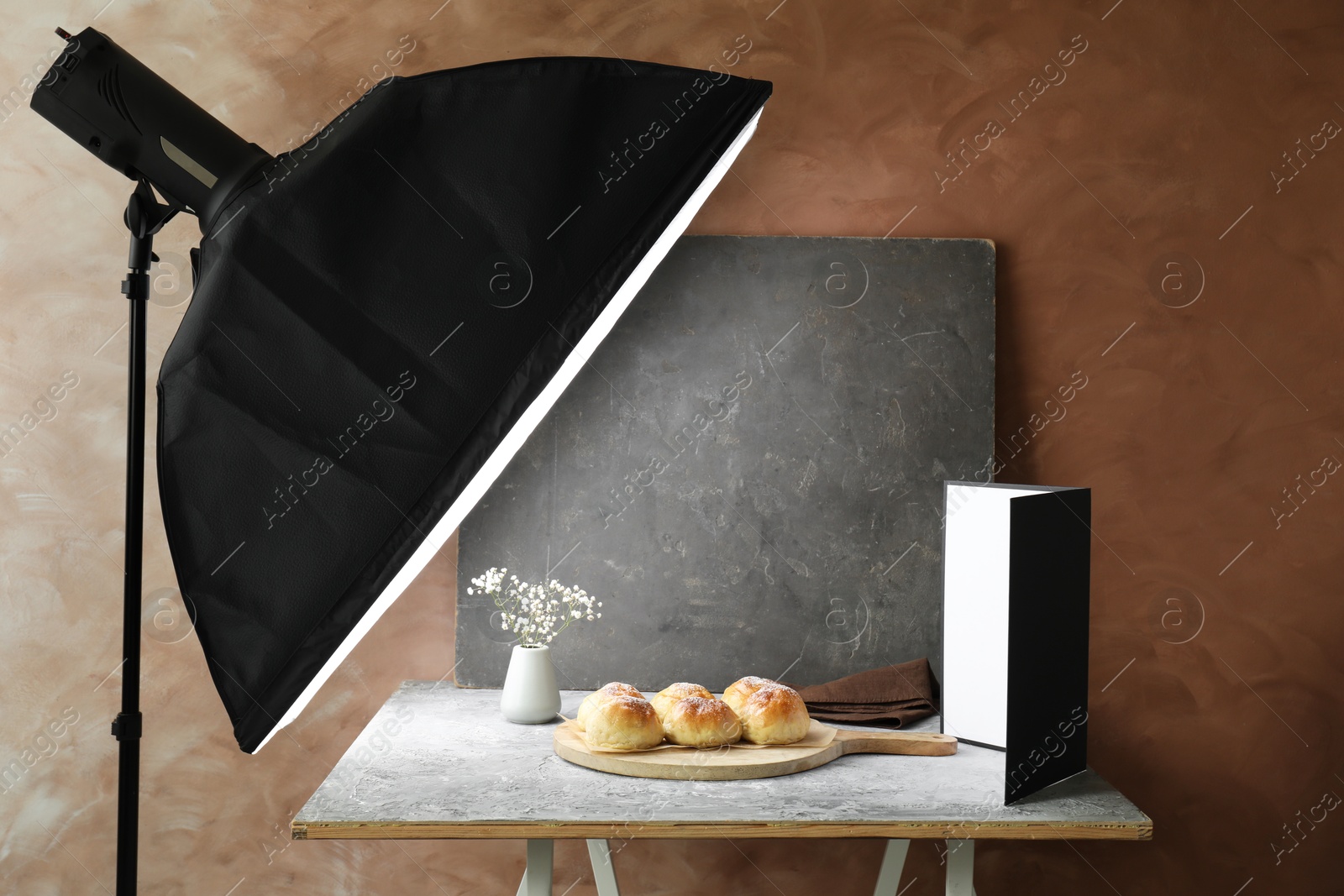 Photo of Shooting food in photo studio with professional lighting equipment