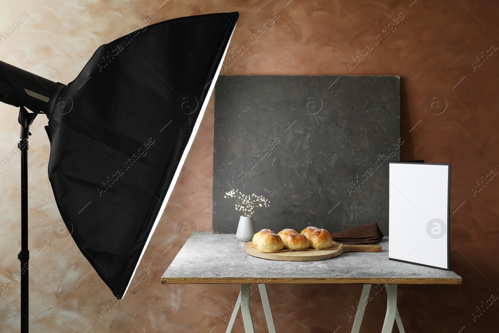 Photo of Shooting food in photo studio with professional lighting equipment