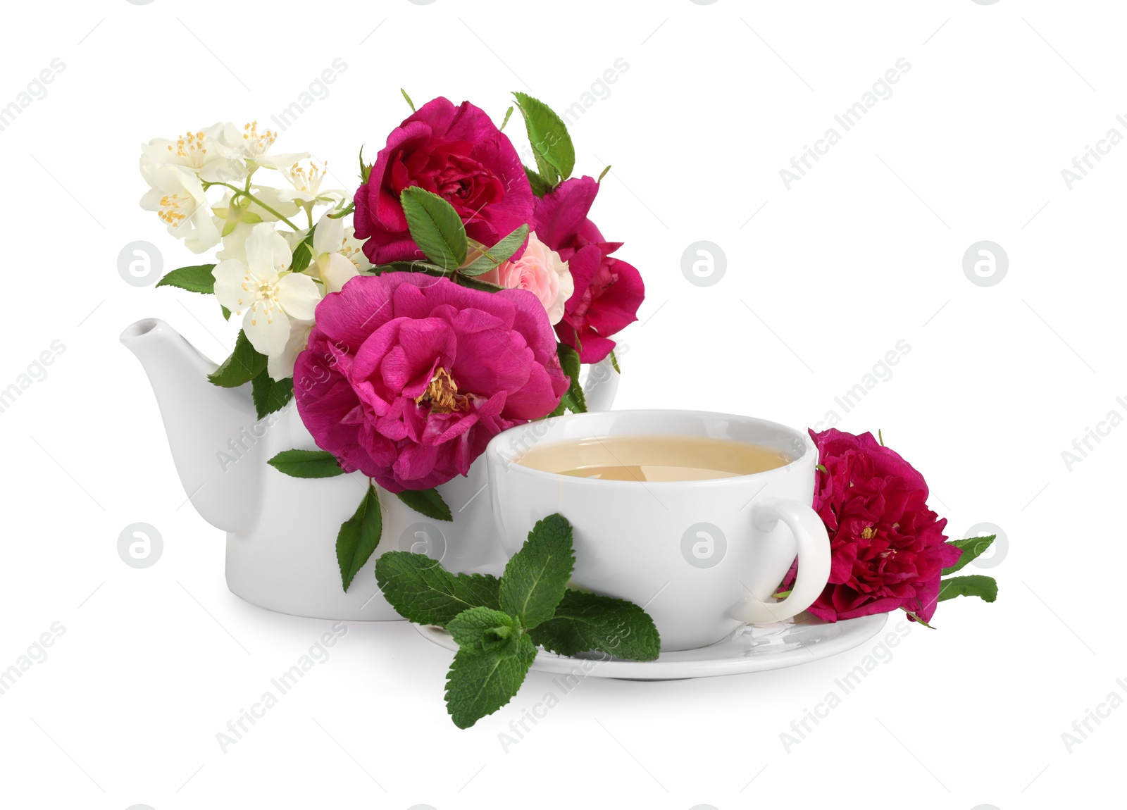 Photo of Aromatic herbal tea with different flowers isolated on white