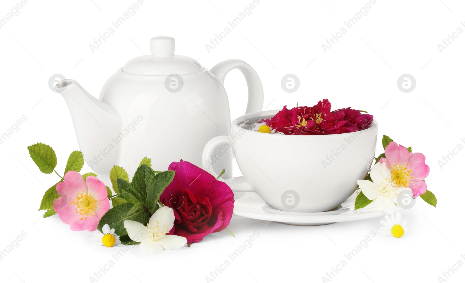 Photo of Aromatic herbal tea with different flowers isolated on white