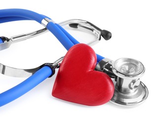 Stethoscope and red heart isolated on white