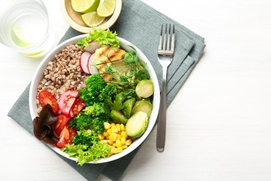 Photo of Healthy meal. Tasty products in bowl on white table, top view. Space for text