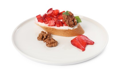 Photo of Delicious bruschetta with ricotta cheese, strawberries, mint and walnuts isolated on white