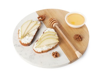 Photo of Delicious ricotta bruschettas with pear, honey and walnut isolated on white