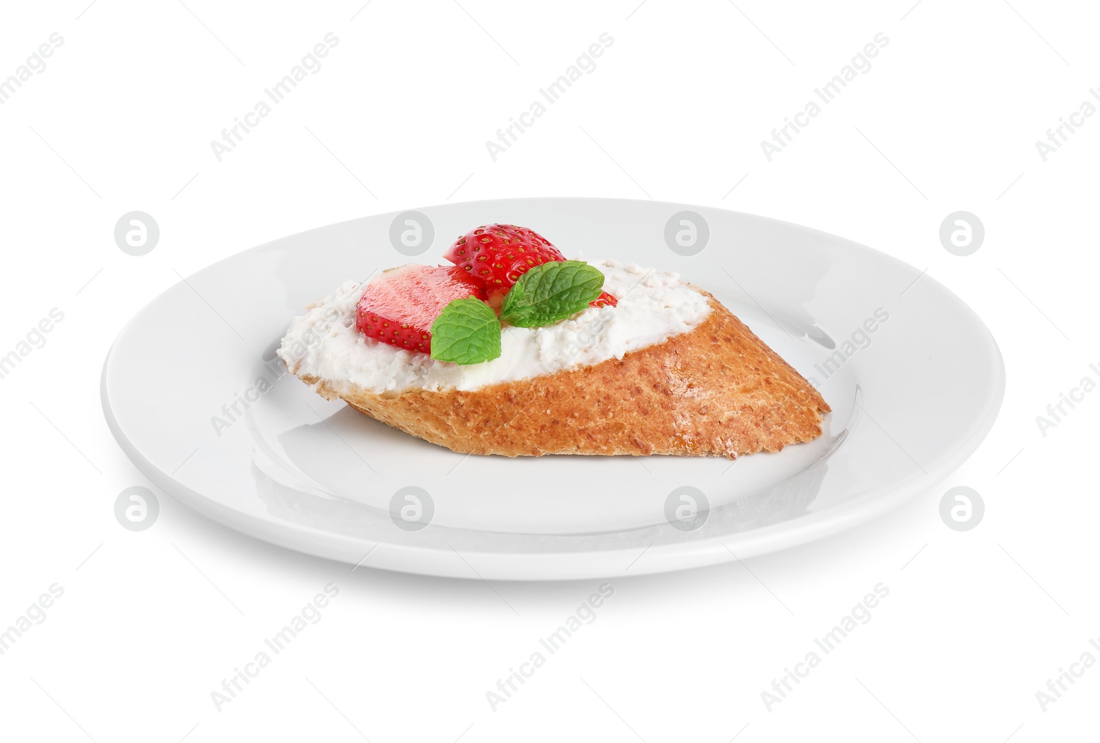 Photo of Delicious ricotta bruschetta with strawberry and mint isolated on white