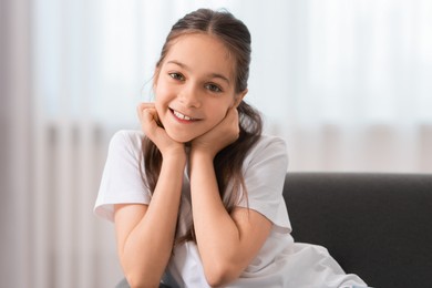 Photo of Portrait of happy little girl indoors. Cute child