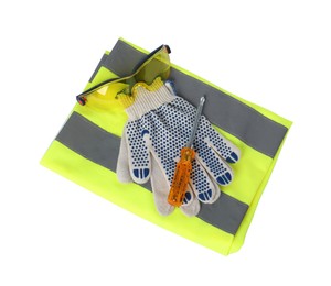 Photo of Protective gloves, goggles, screwdriver and reflective vest isolated on white, top view
