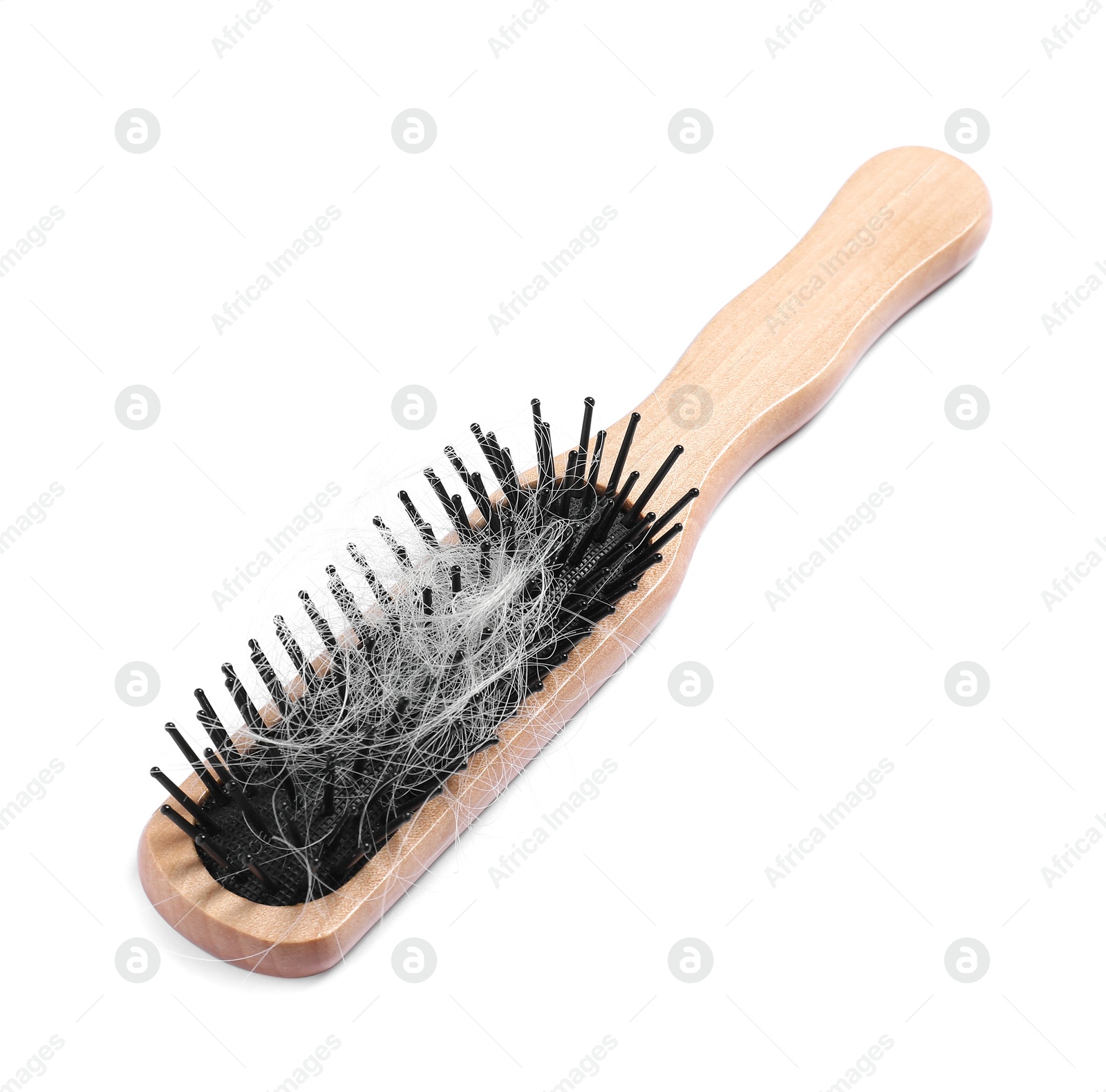 Photo of Wooden brush with lost hair isolated on white