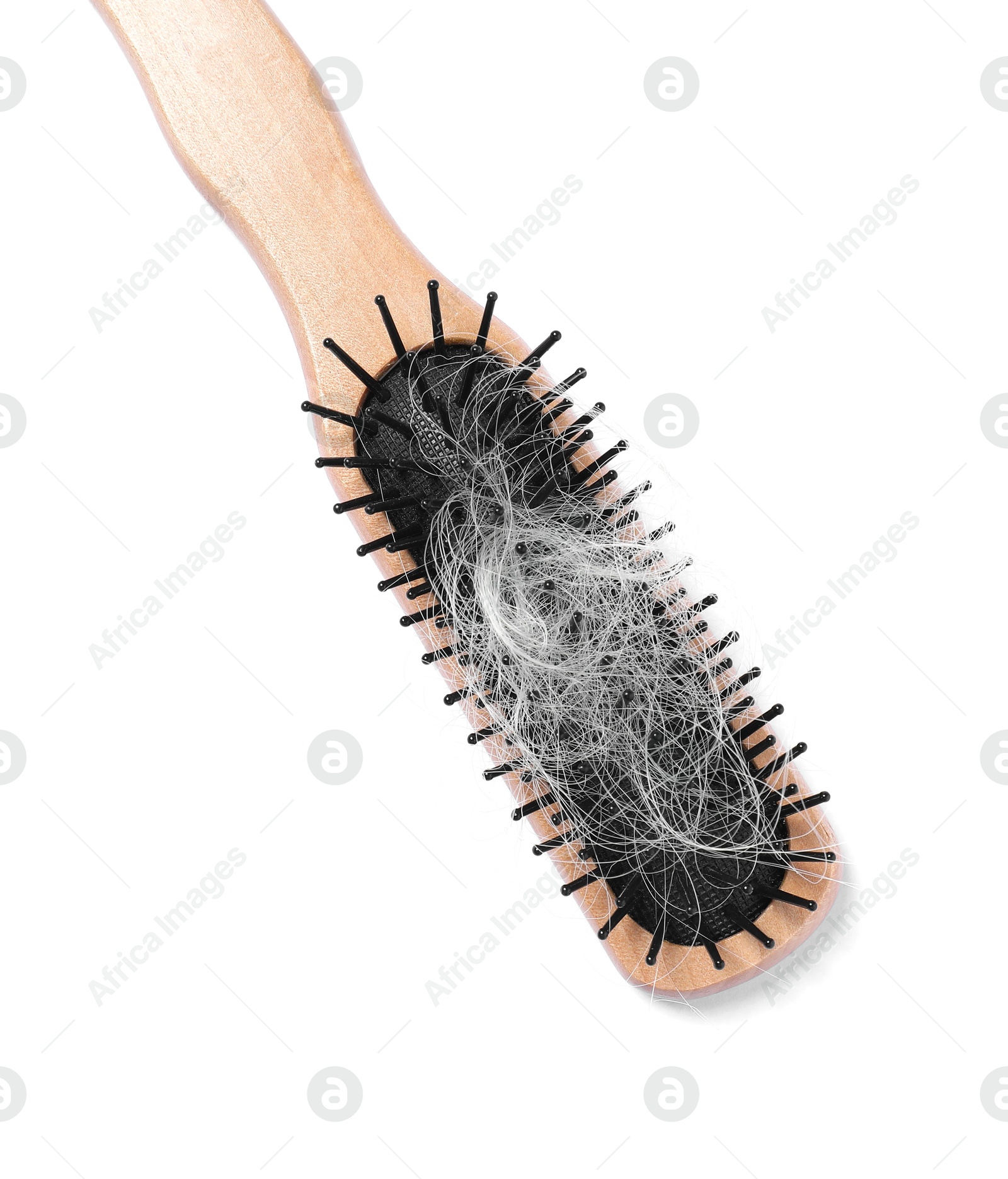 Photo of Wooden brush with lost hair isolated on white, top view