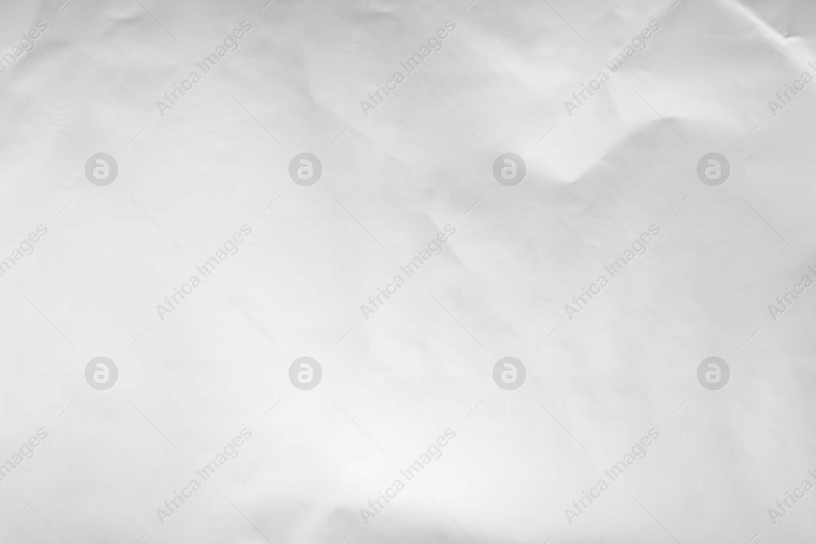 Photo of Shiny silver foil as background, top view