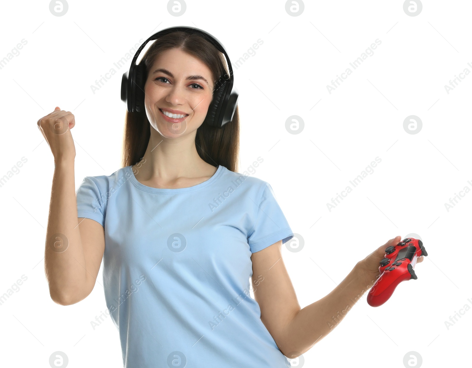 Photo of Happy woman in headphones with controller on white background