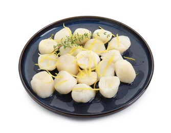 Photo of Raw scallops with thyme and lemon zest isolated on white