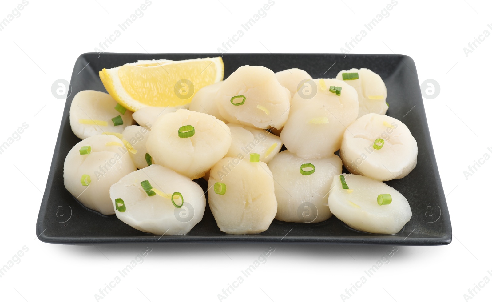 Photo of Raw scallops with green onion and lemon isolated on white