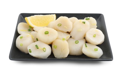 Raw scallops with green onion and lemon isolated on white