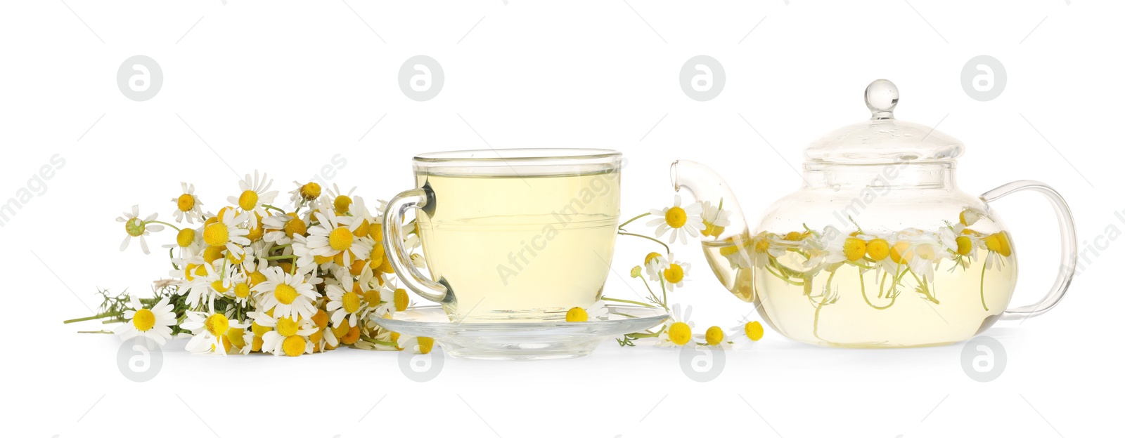 Photo of Aromatic herbal tea with chamomile flowers isolated on white