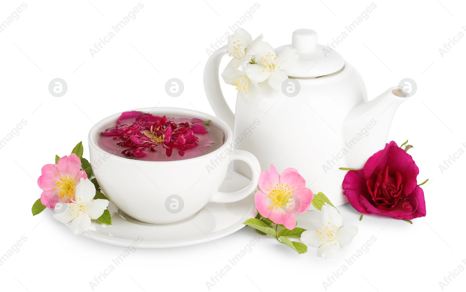 Photo of Aromatic herbal tea with different flowers isolated on white