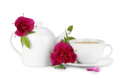 Photo of Aromatic herbal tea with rose flowers isolated on white