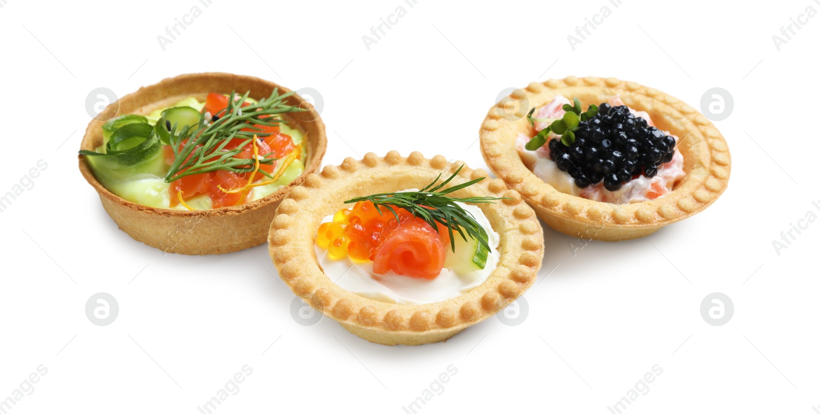 Photo of Delicious canapes with salmon and caviar isolated on white