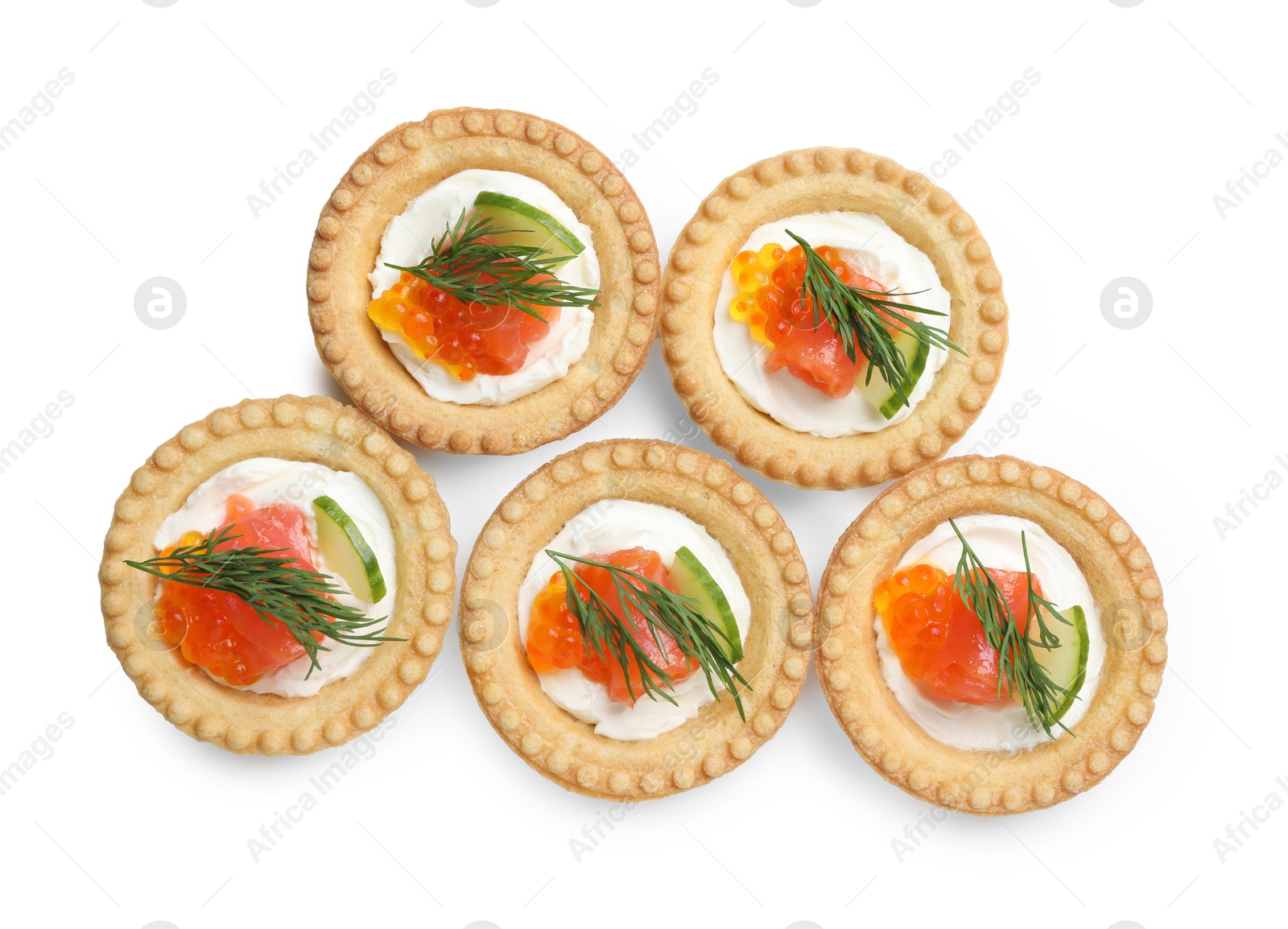 Photo of Delicious canapes with salmon and red caviar isolated on white, top view