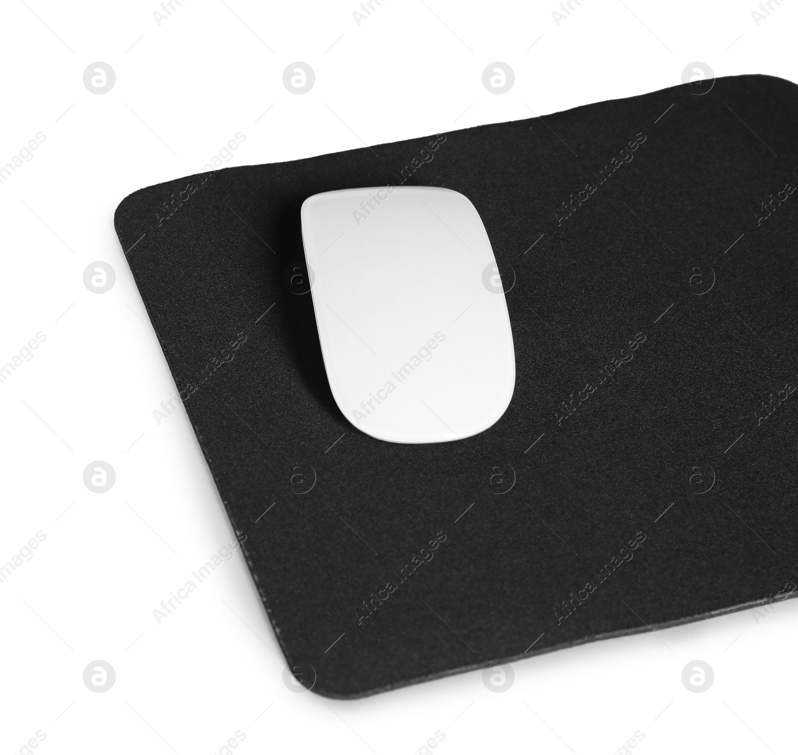 Photo of Wireless mouse and mousepad isolated on white