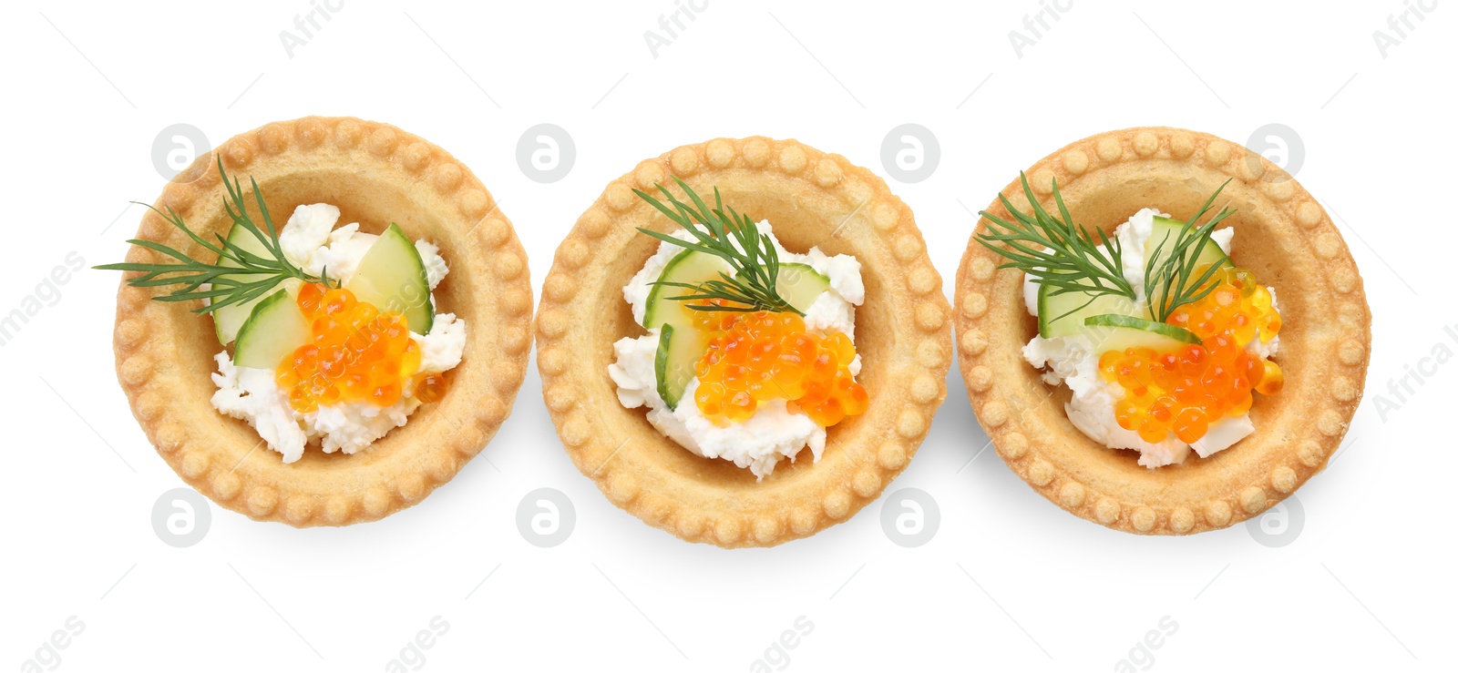 Photo of Delicious canapes with red caviar isolated on white, top view