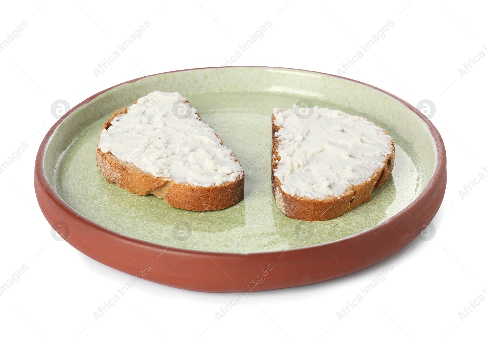 Photo of Plate with delicious ricotta bruschettas isolated on white