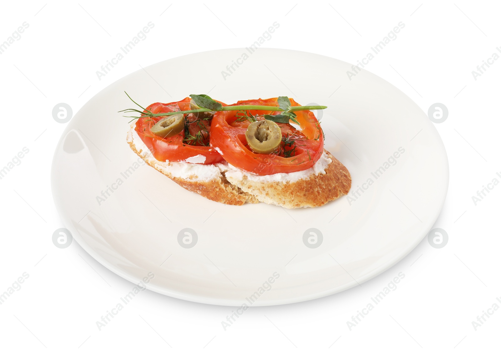 Photo of Delicious ricotta bruschetta with sliced tomatoes, olives and greens isolated on white