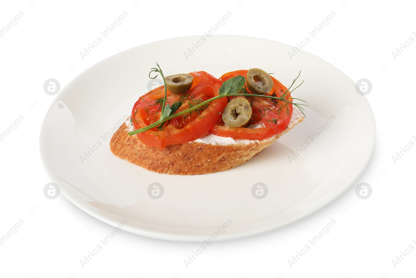 Photo of Delicious ricotta bruschetta with sliced tomatoes, olives and greens isolated on white