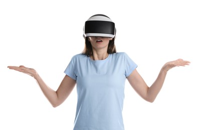 Photo of Surprised woman using virtual reality headset on white background