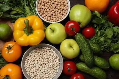 Photo of Different vegetarian products on table, top view