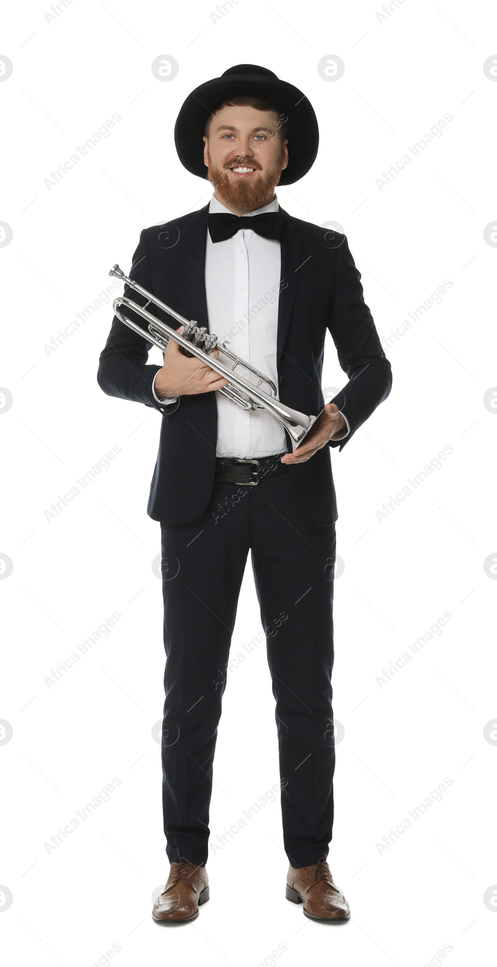 Photo of Smiling musician with trumpet on white background