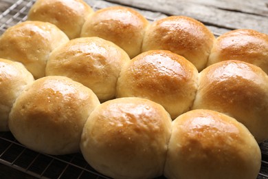 Photo of Many delicious dough balls on table, closeup