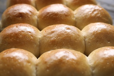 Many delicious dough balls on table, closeup