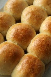 Many delicious dough balls on table, closeup