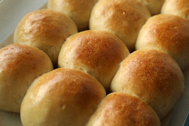 Many delicious dough balls on table, closeup