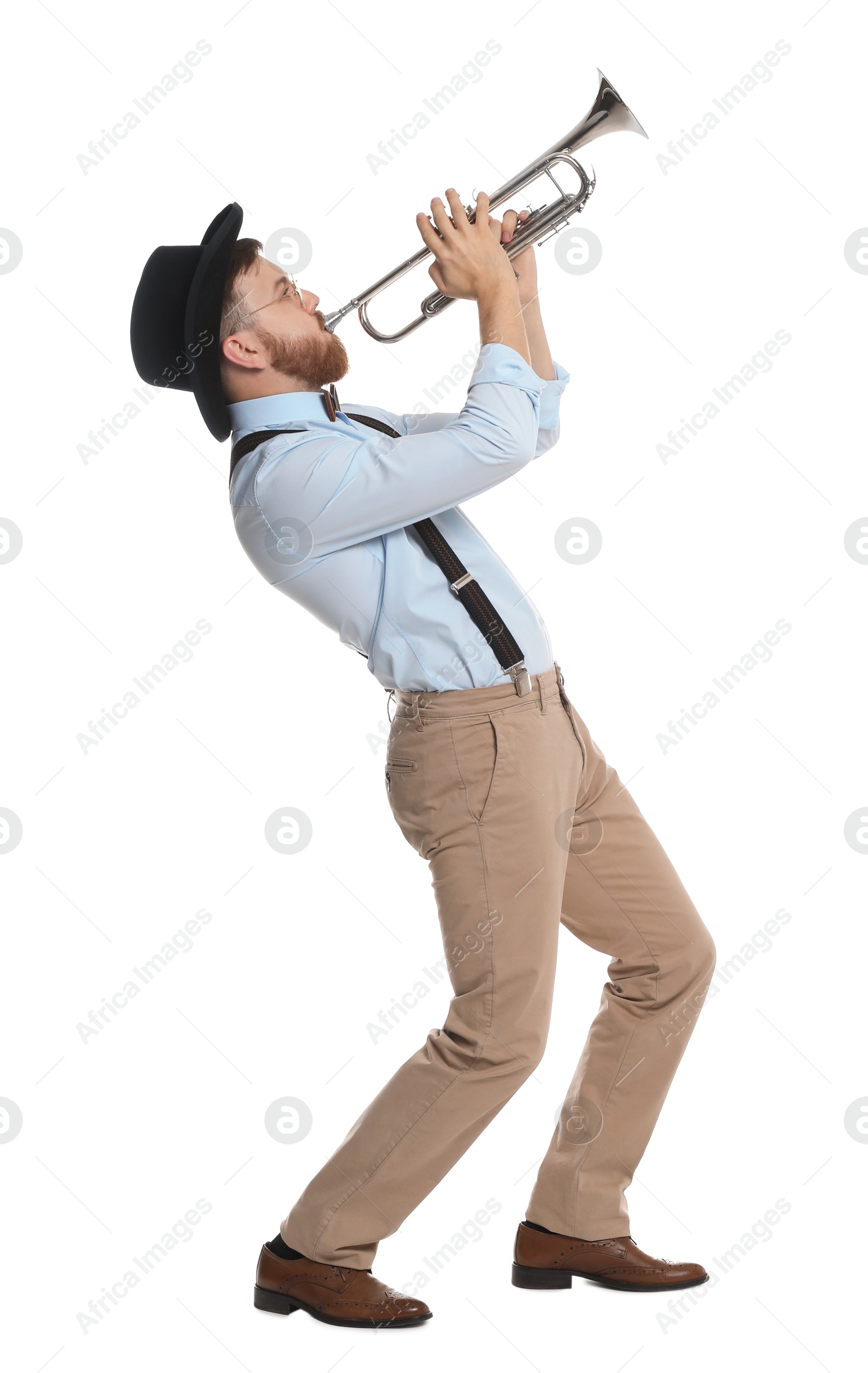 Photo of Handsome musician playing trumpet on white background